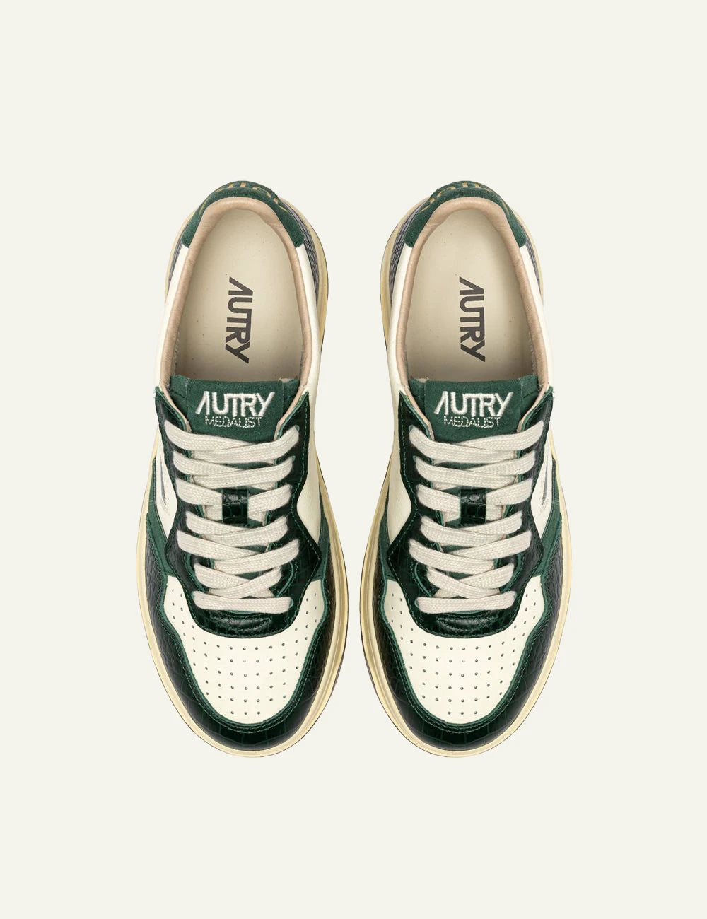 Autry women’s ivory leather sneakers with green crocodile-effect details top