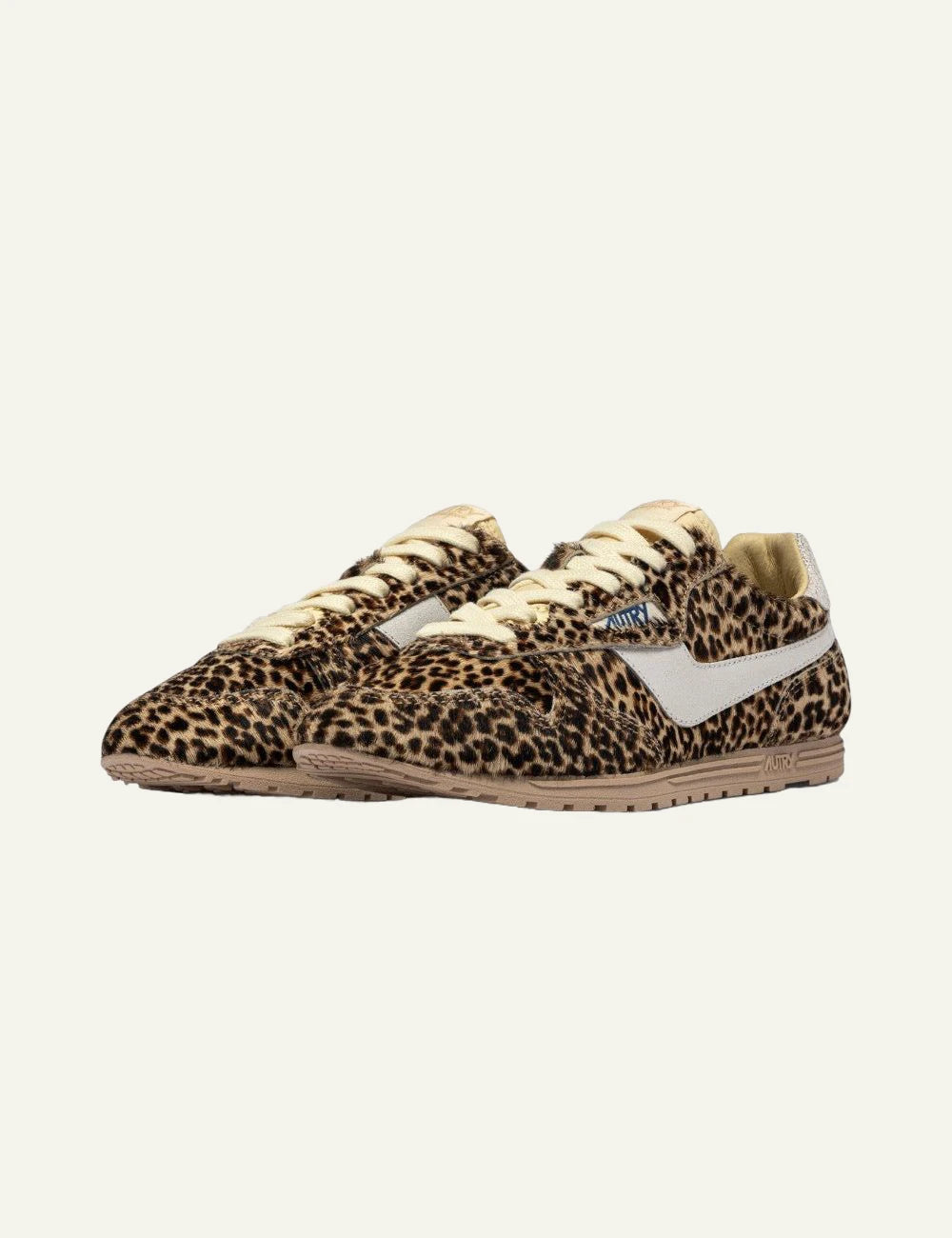 Autry women’s leopard and white Windspin Low pony-effect sneakers profile