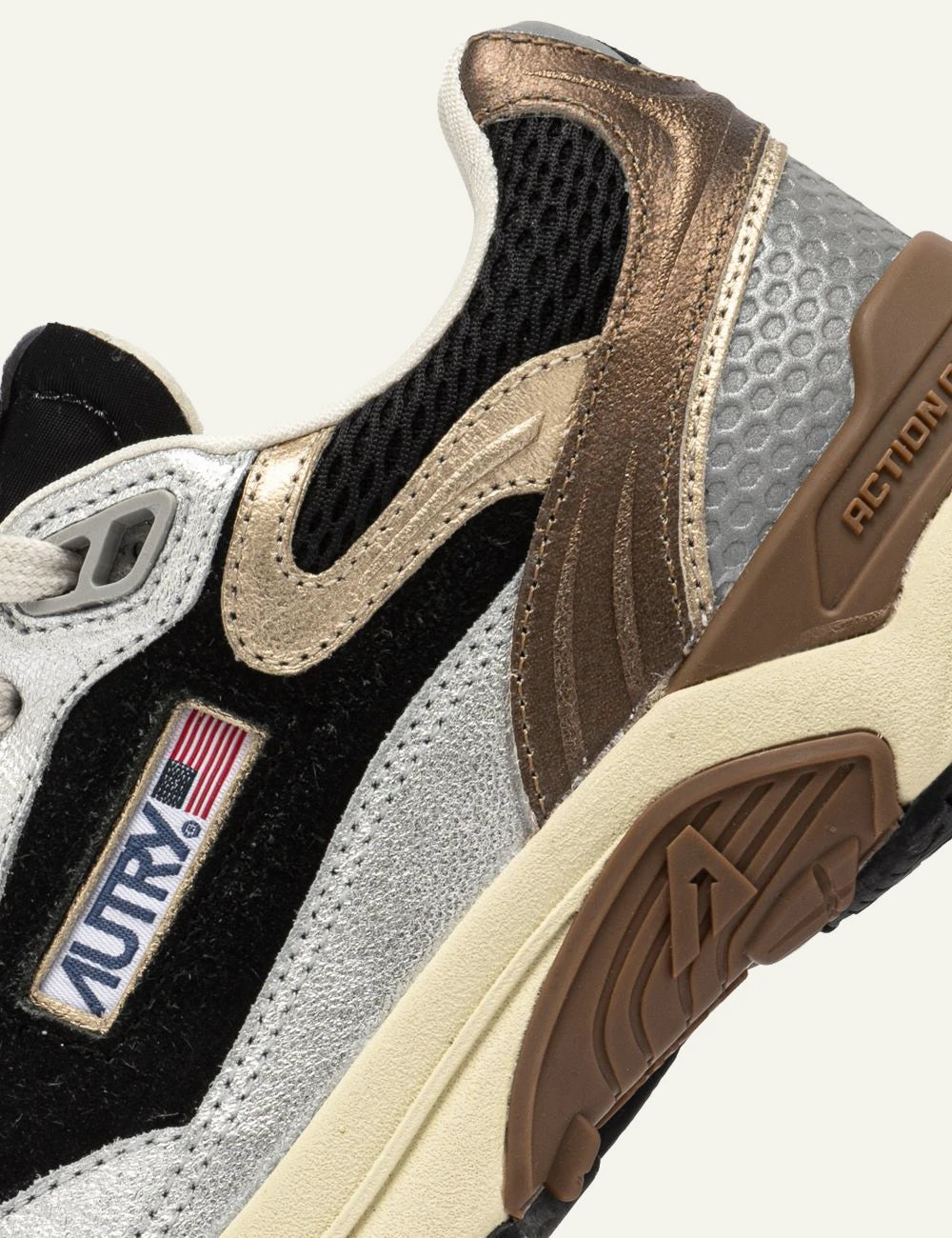 Autry women’s silver and black sneakers with suede and mesh details logo