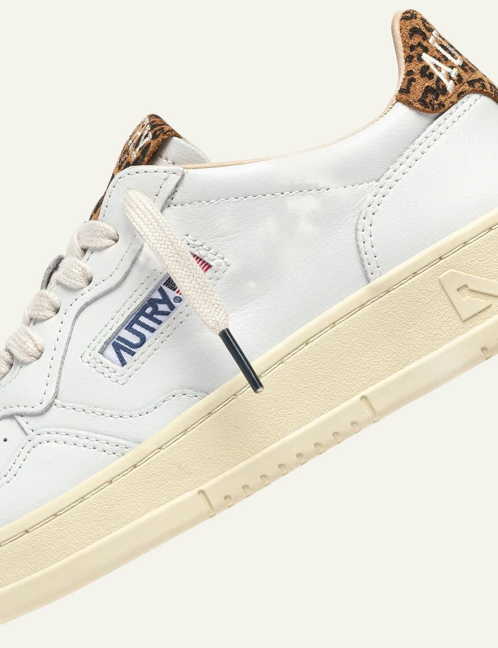 Autry women’s white leather sneakers with leopard-print suede details logo