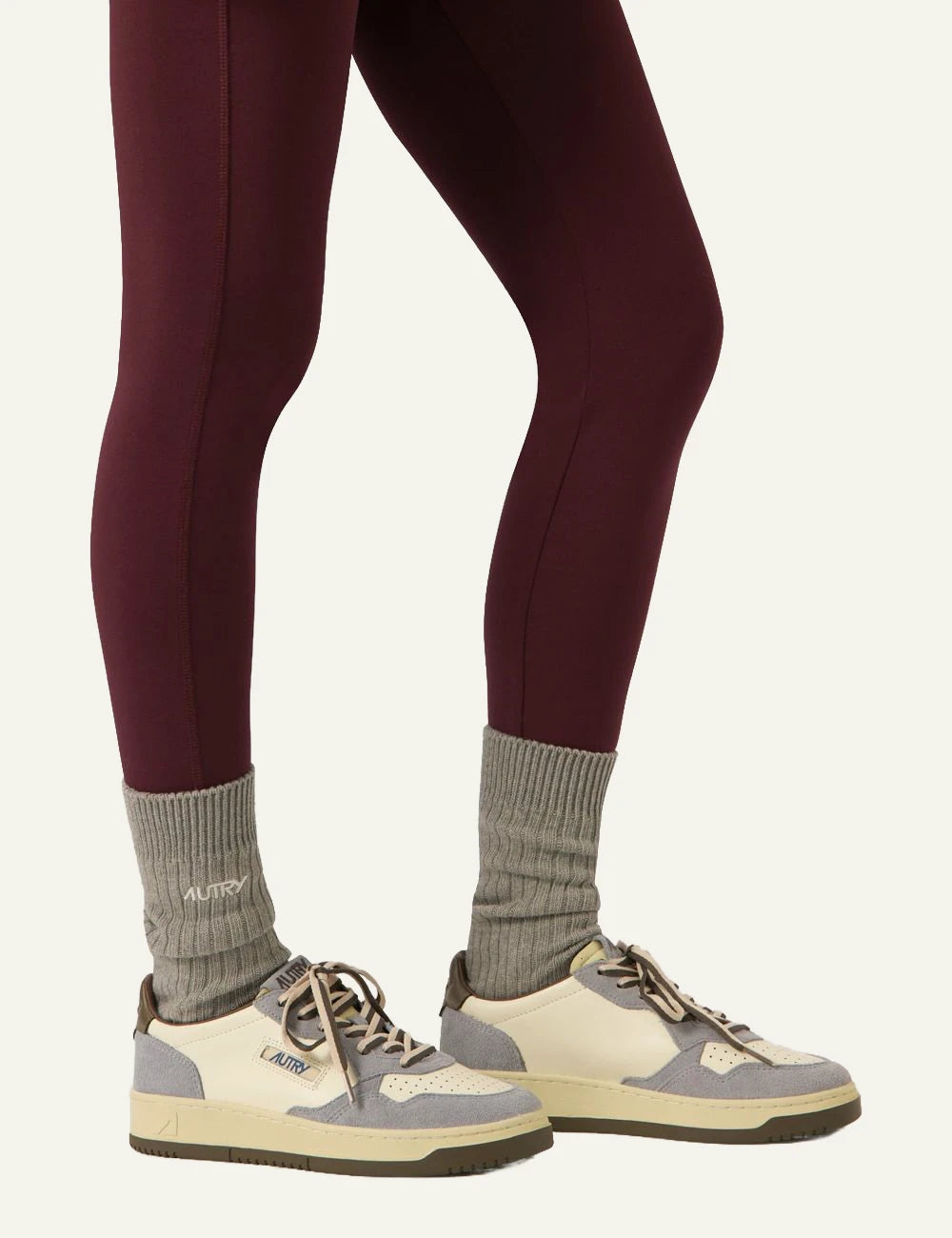 Autry women’s white leather sneakers with light blue suede and brown details model