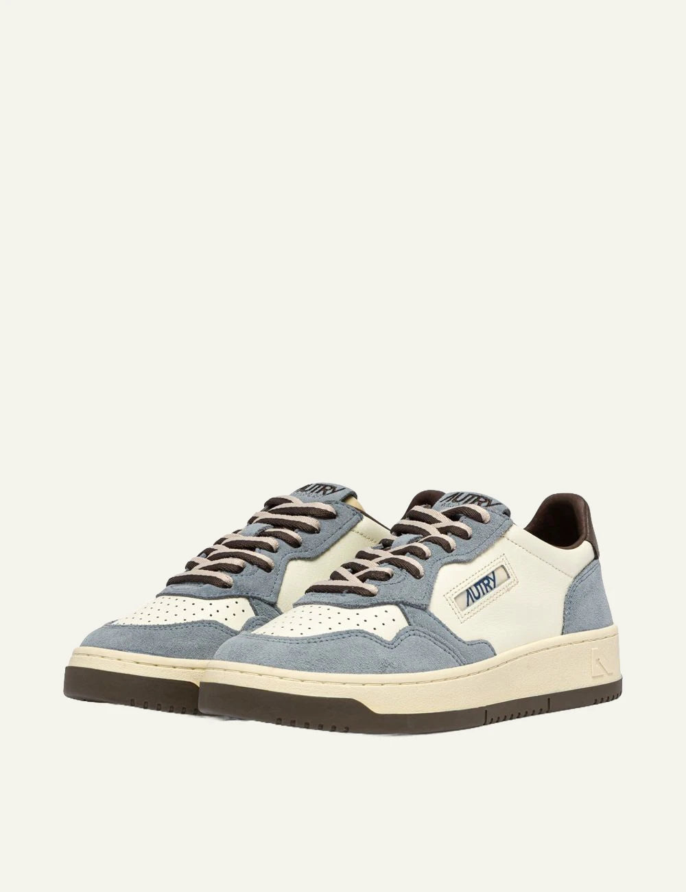 Autry women’s white leather sneakers with light blue suede and brown details profile