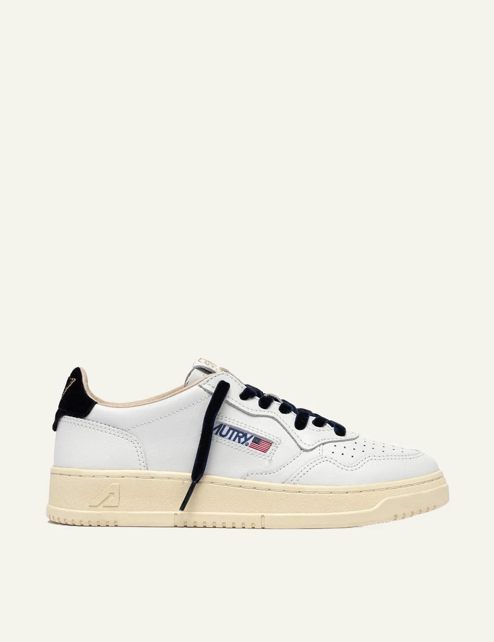 Autry women’s white leather sneakers with navy velvet details