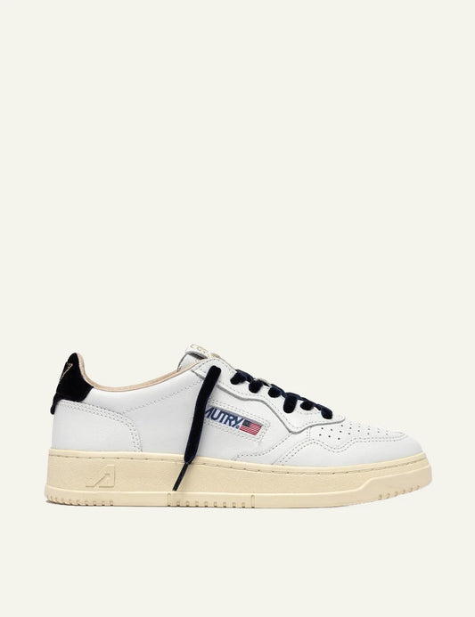 Autry women’s white leather sneakers with navy velvet details