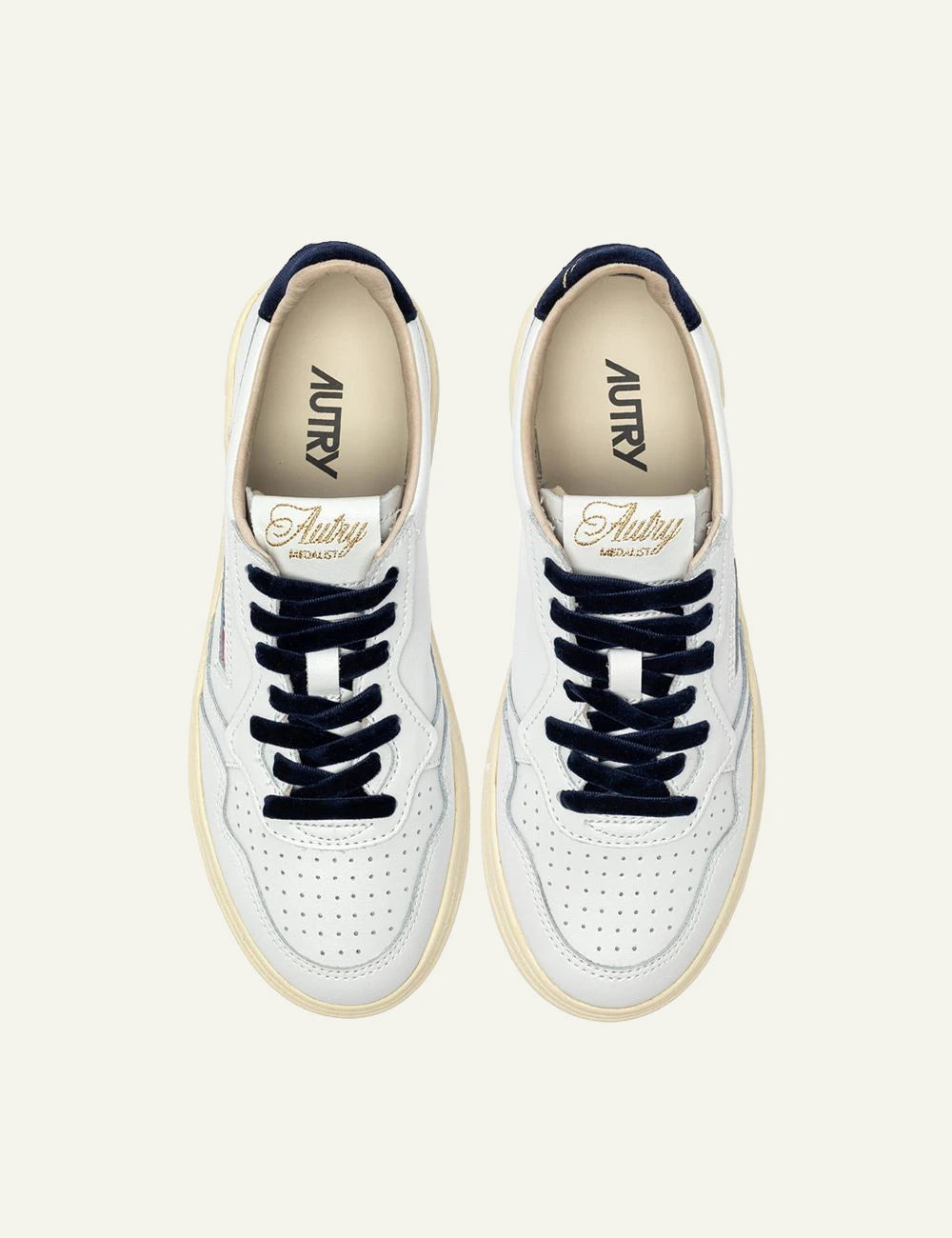 Autry women’s white leather sneakers with navy velvet details top