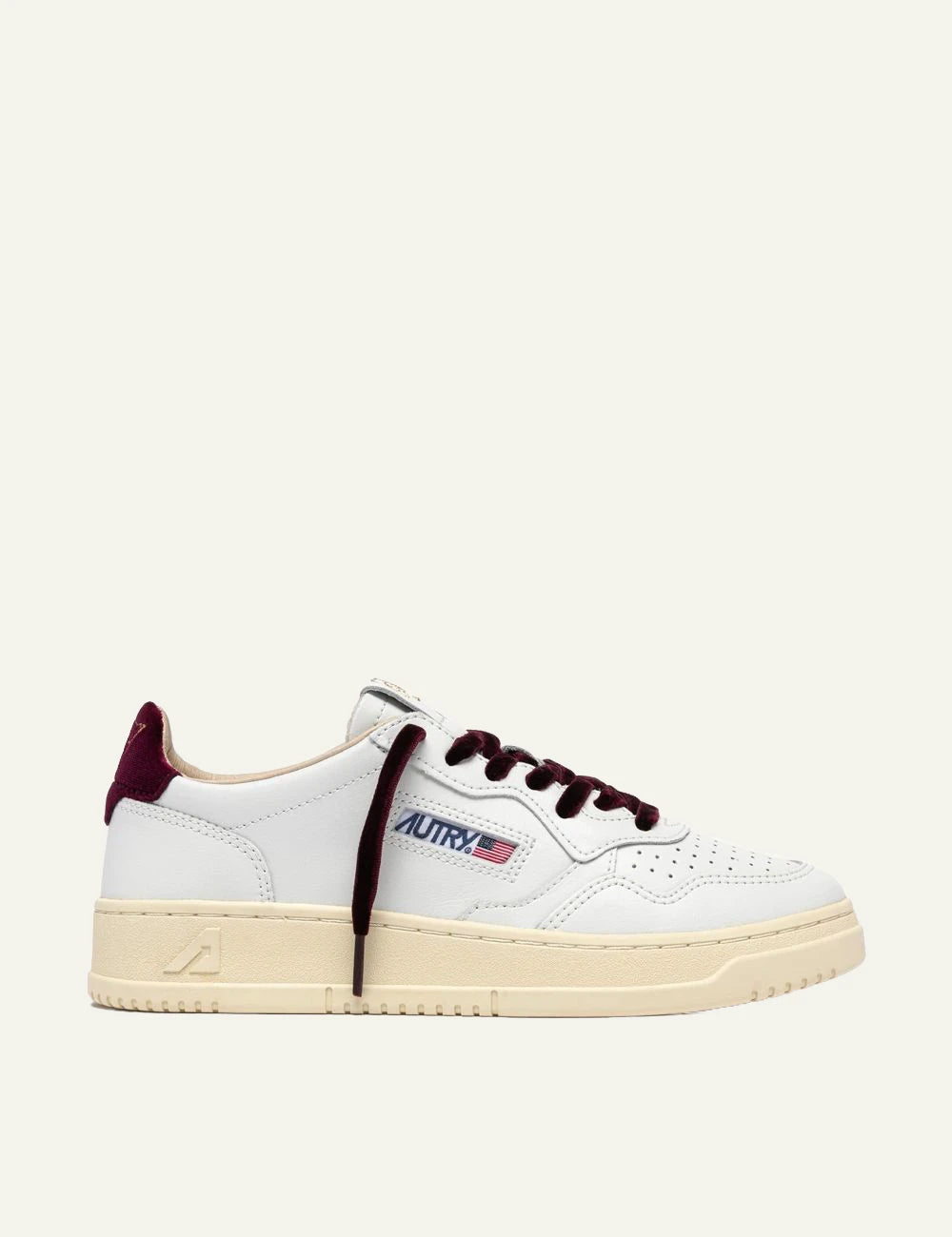 Autry women’s white leather sneakers with purple velvet details