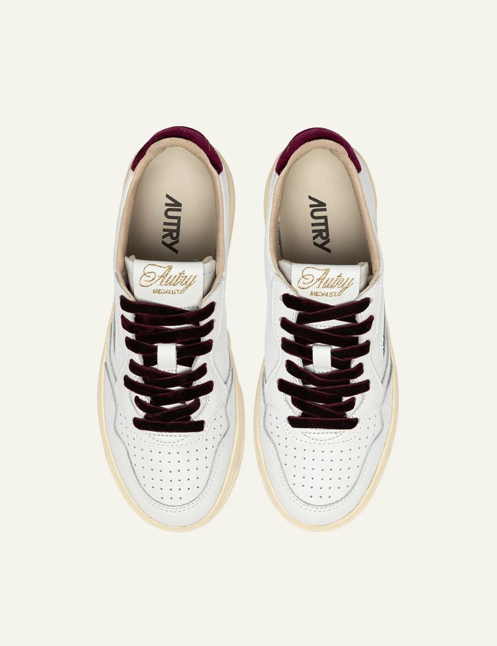 Autry women’s white leather sneakers with purple velvet details top