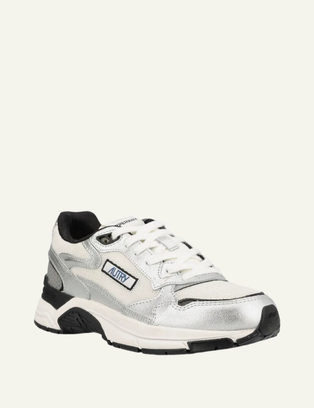 Autry women’s white and silver Hyperway sneakers with black details angled