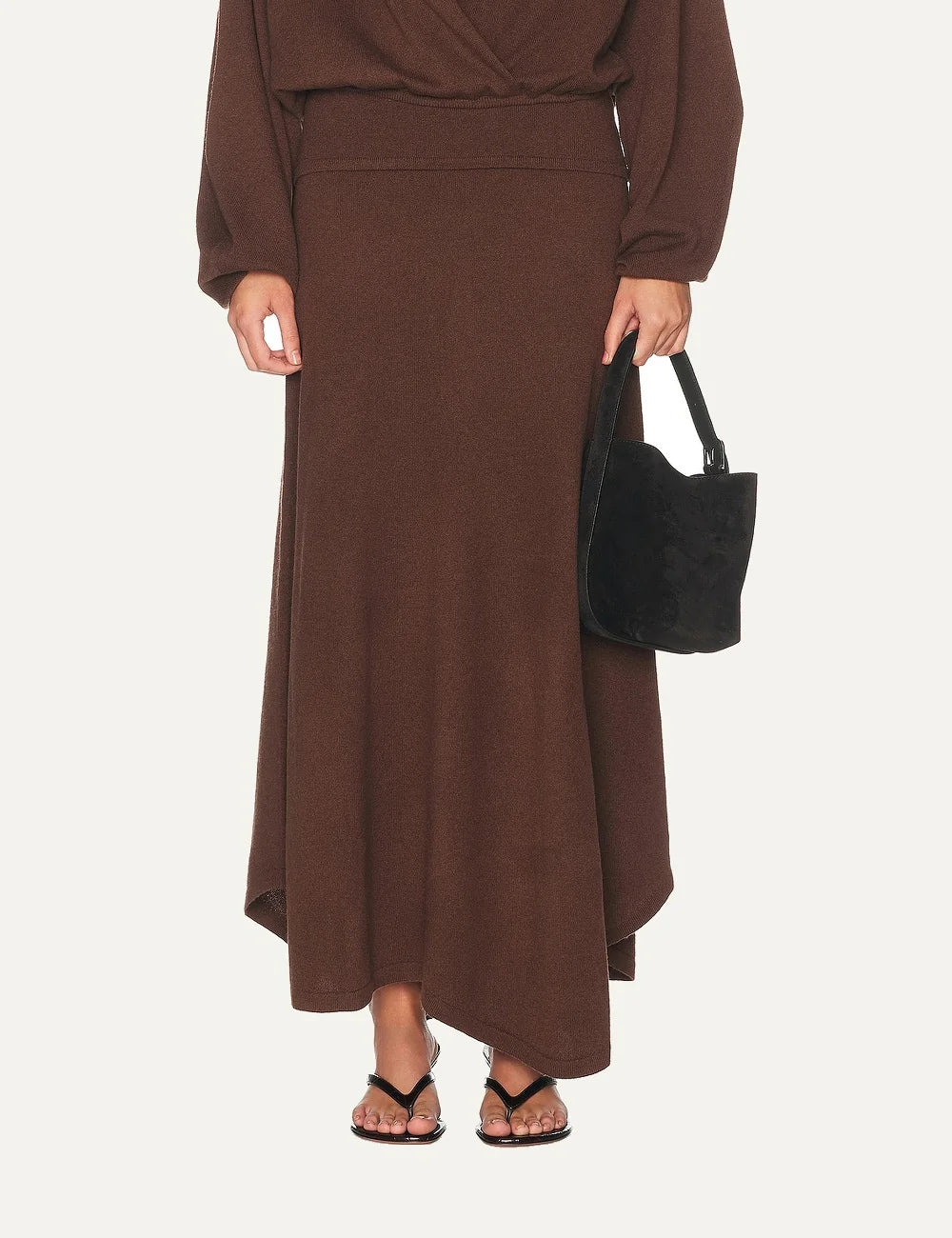 Women's Aya Muse brown maxi knit skirt in wool and cashmere blend with fold-over waistband and asymmetric hem model