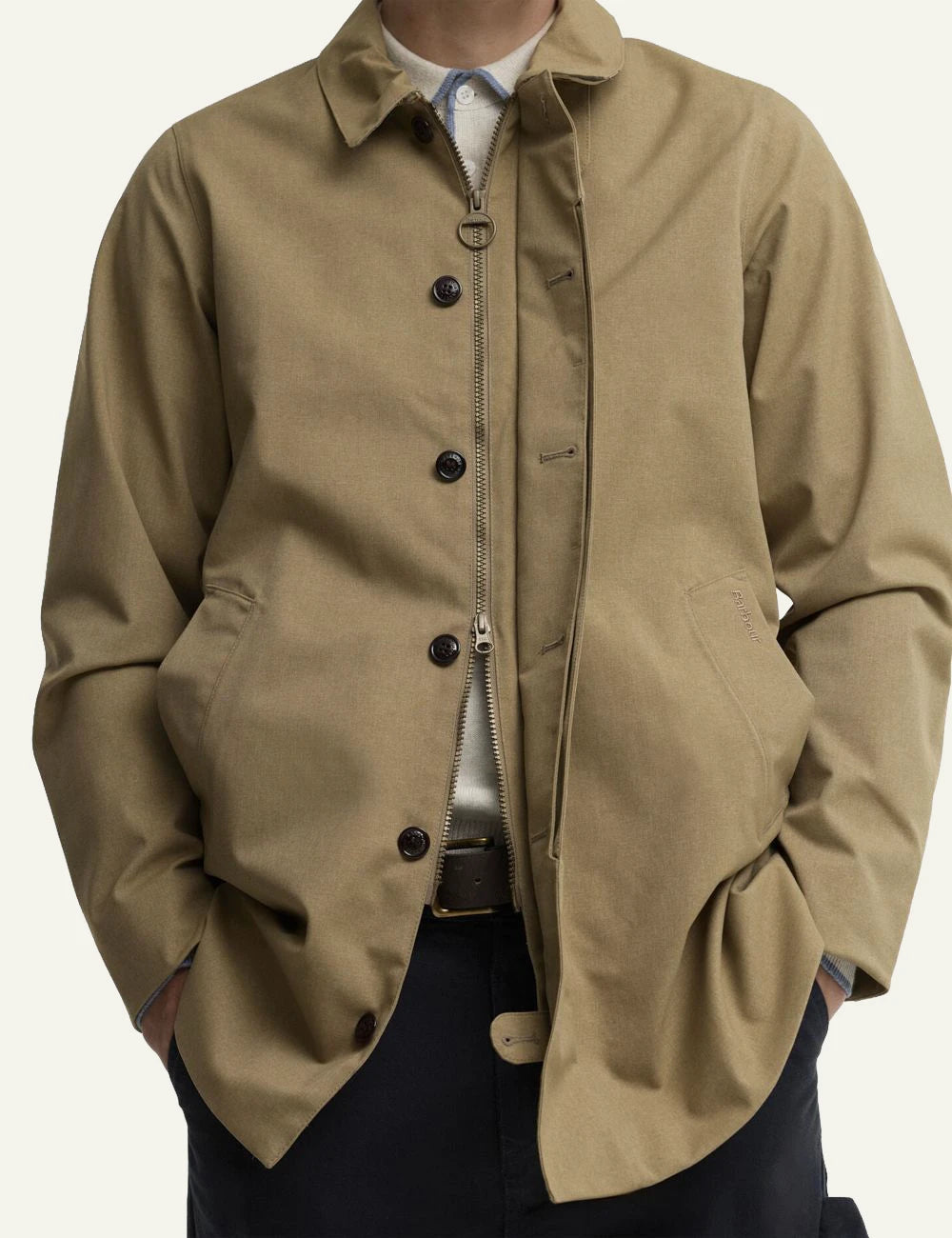 Men's Barbour beige waterproof coat with classic collar and concealed fastening detail