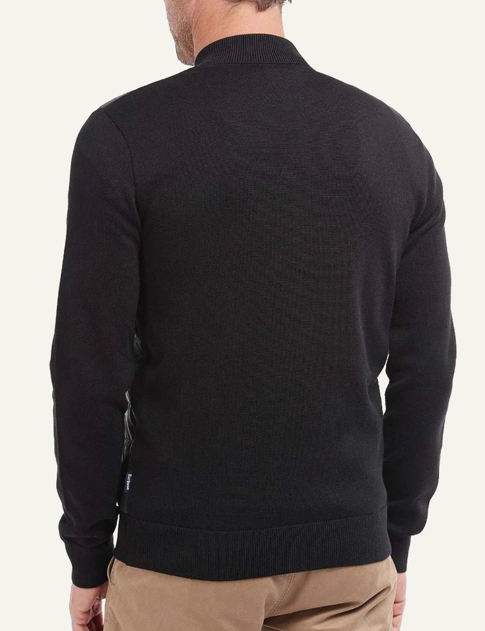 Men's Barbour black quilted jacket with knitted sleeves and zip closure back