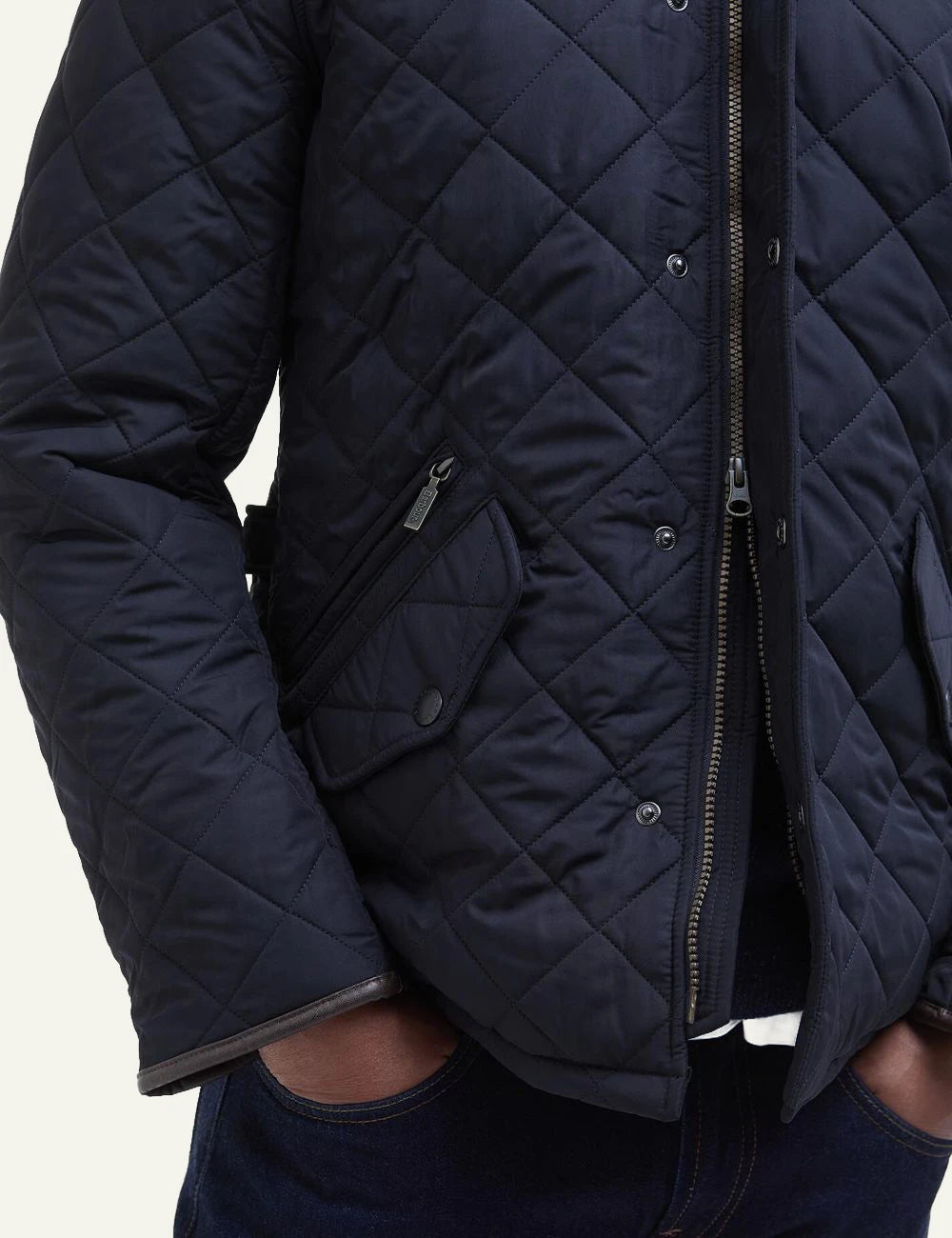 Men's Barbour dark navy quilted jacket with stand collar and front pockets detail