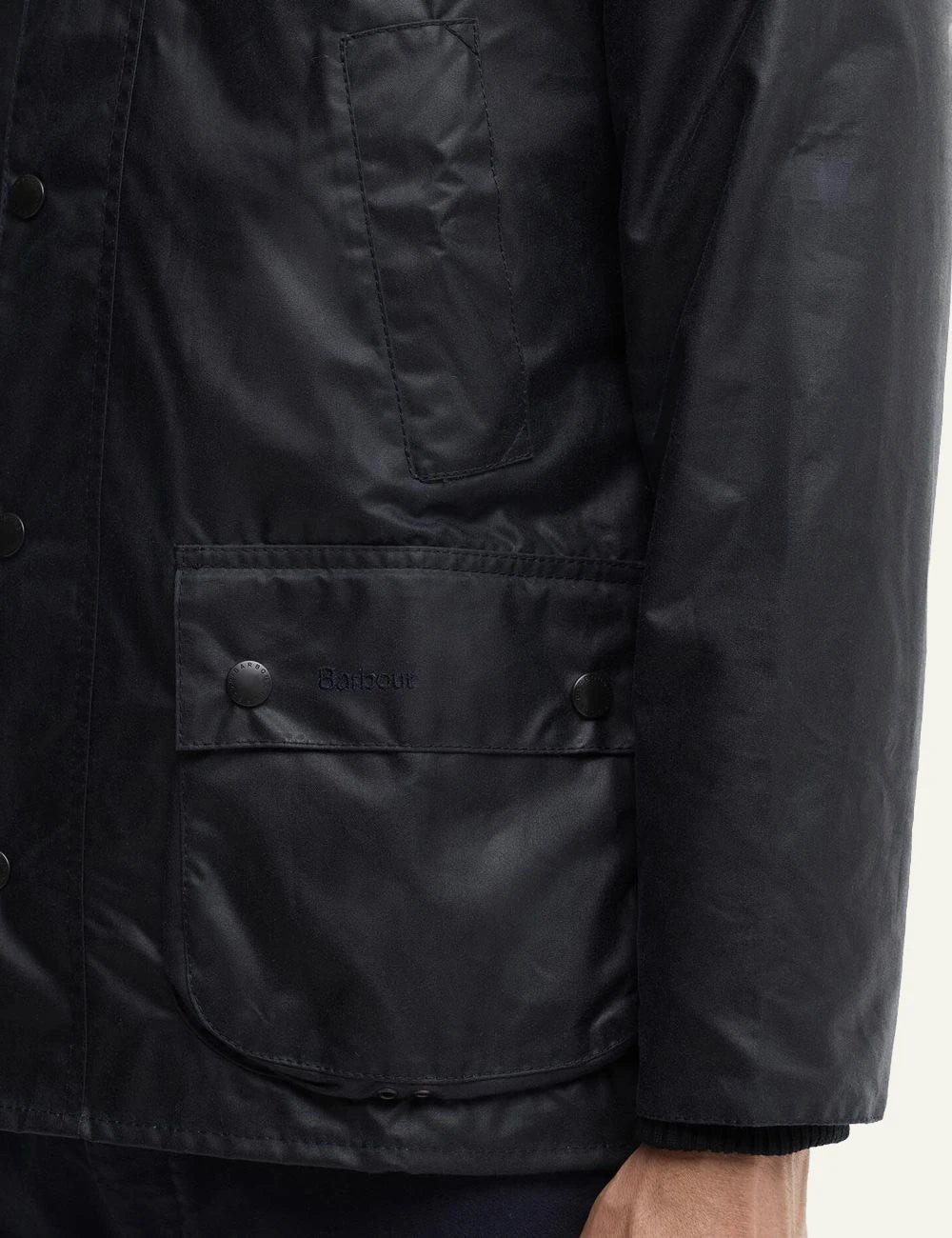 Men's Barbour dark navy waxed cotton jacket with corduroy collar and front pockets detail
