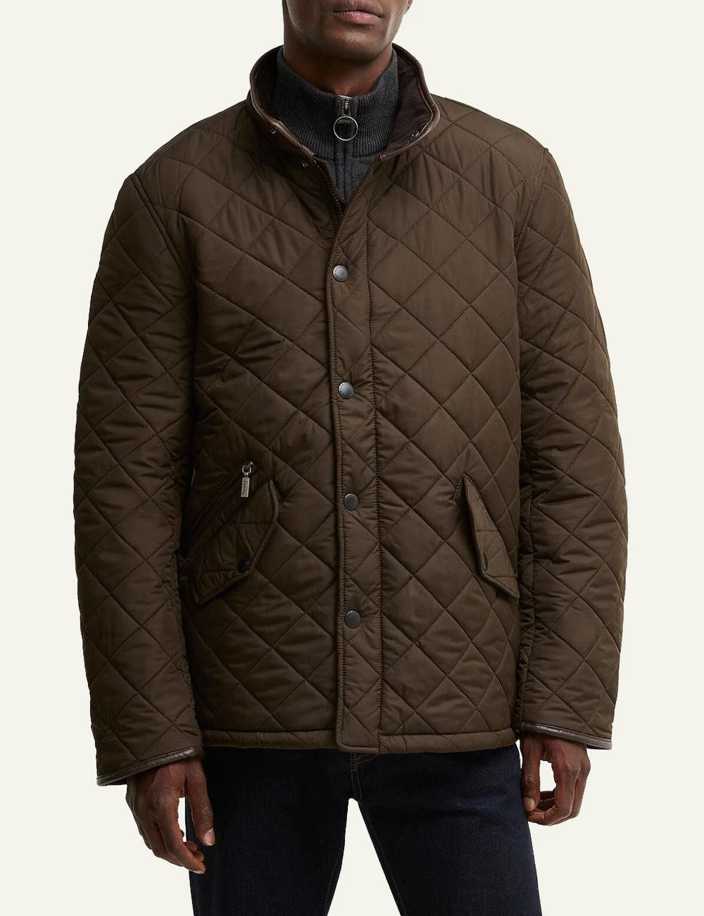 Men's Barbour dark olive quilted jacket with fleece lining and funnel collar model