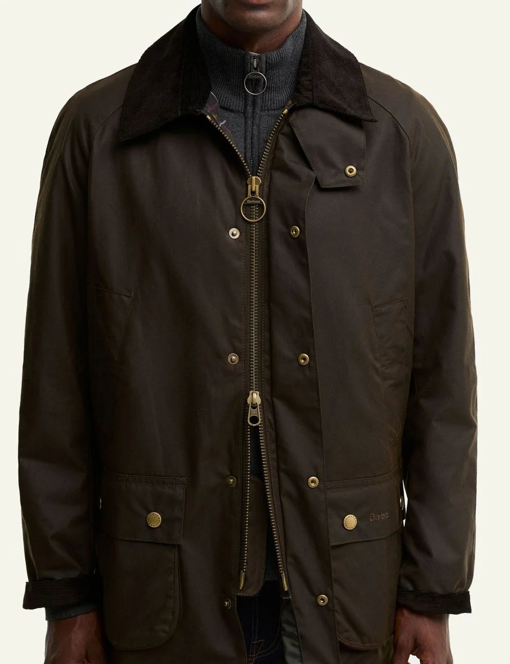 Men's Barbour dark olive waxed cotton jacket with brown corduroy collar model