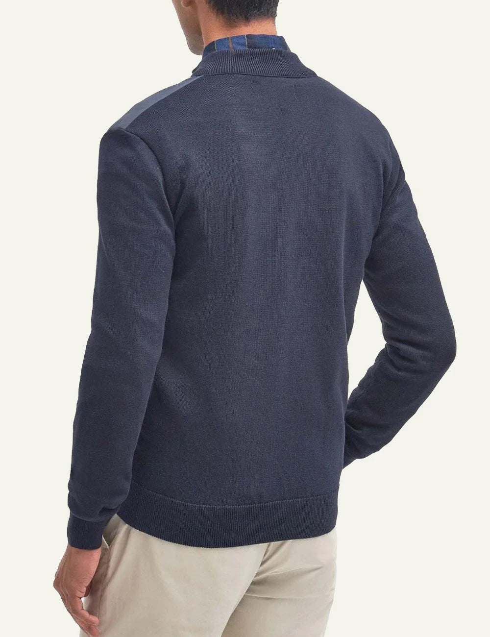 Men's Barbour navy blue quilted jacket with knitted sleeves and zip closure back