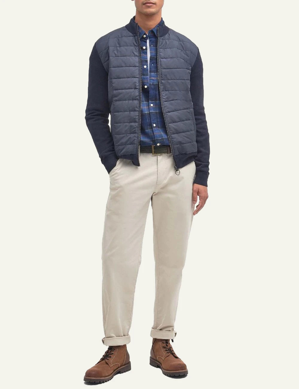 Men's Barbour navy blue quilted jacket with knitted sleeves and zip closure full body