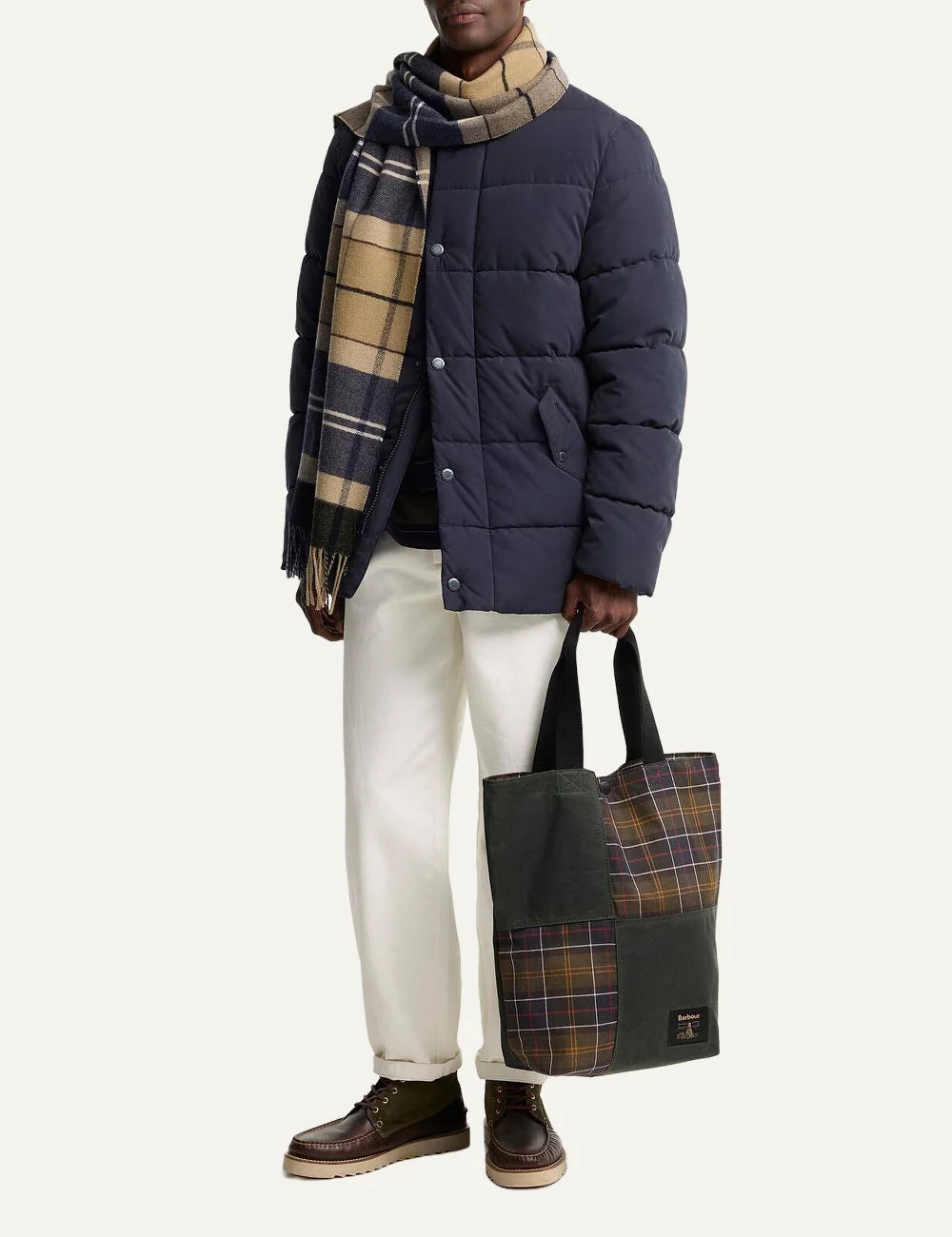 Barbour men's wool tartan scarf in beige navy and black with fringed edges model
