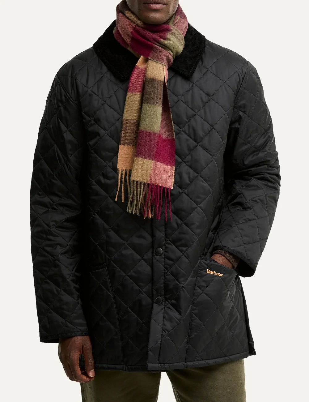 Barbour unisex wool scarf with burgundy olive brown and beige tattersall check pattern and fringed edges model