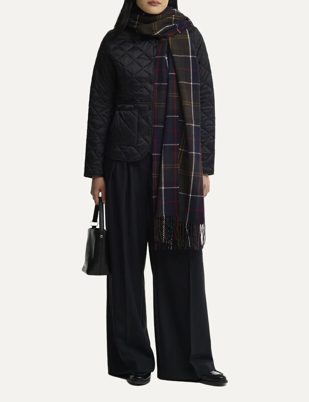 Barbour women Hailes navy tartan scarf wrap with olive red white and mustard check pattern and fringed edges model