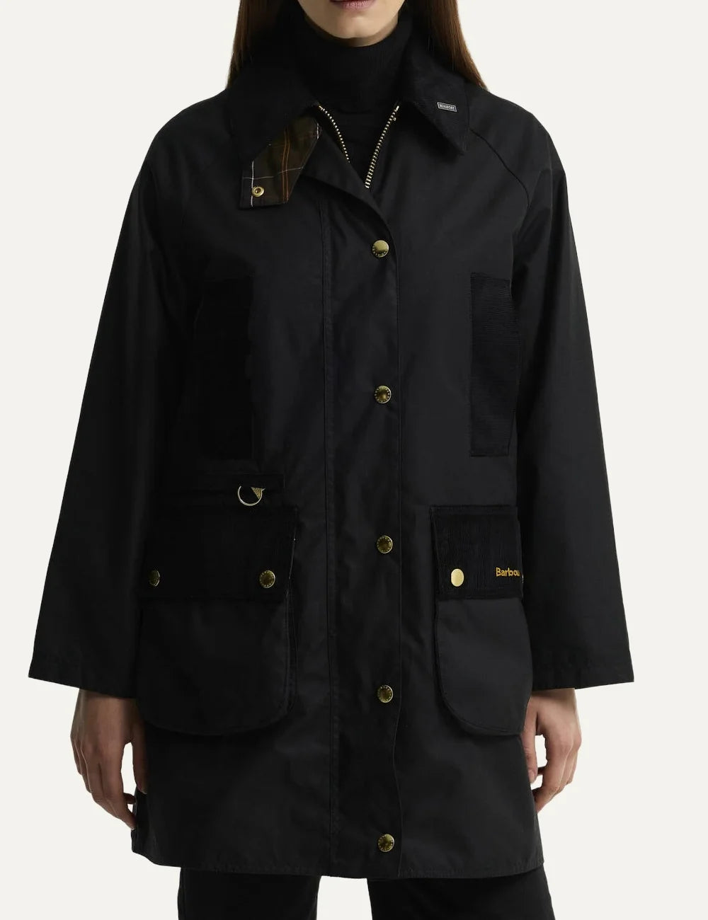 Barbour women Icons Modern Beaufort black waxed cotton jacket with corduroy collar tartan lining and utility pockets model