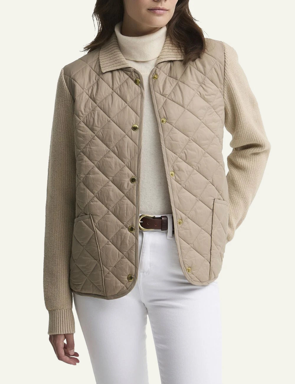 Women's Barbour beige quilted jacket with knitted sleeves and front pockets model