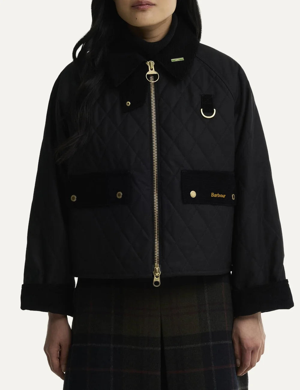 Barbour women's black quilted waxed cotton jacket with cord collar gold-tone zip flap pockets and D-ring detail model