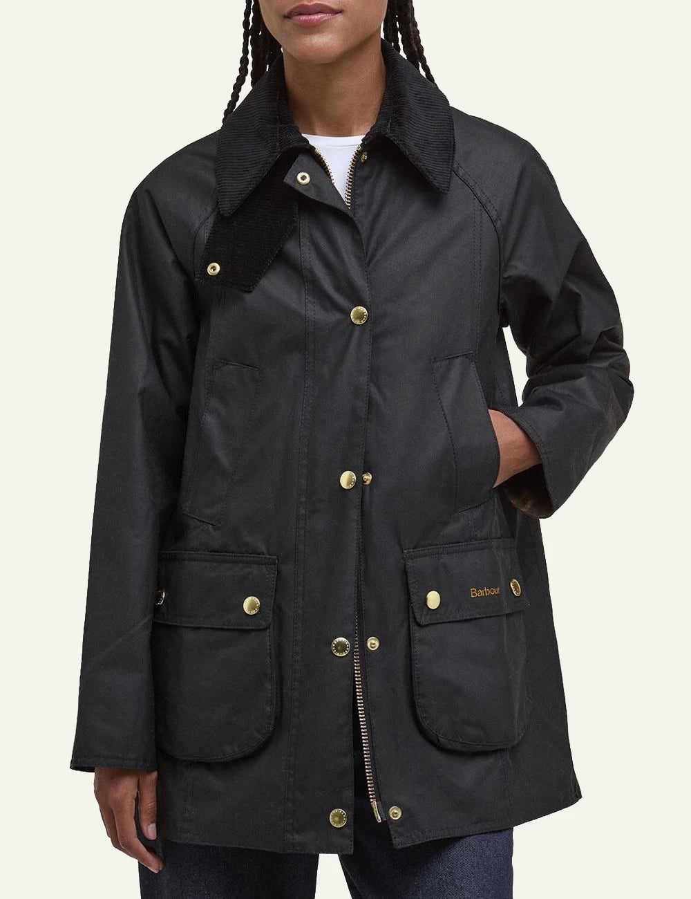 Women's Barbour black waxed jacket with oversized corduroy collar and gold-tone buttons model