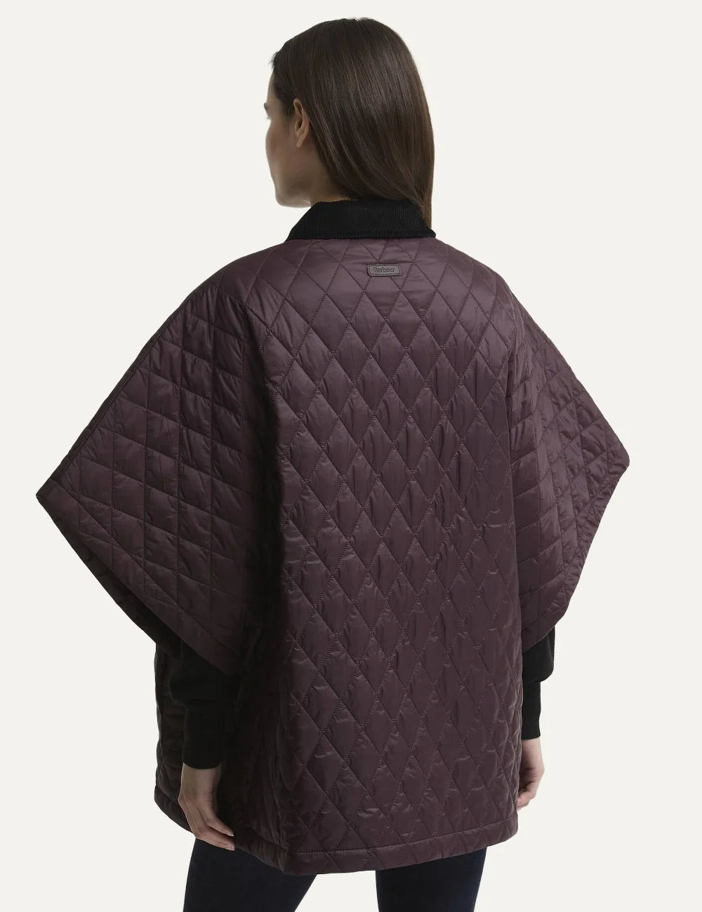 Barbour women's burgundy quilted cape with black corduroy collar snap fastening and large patch pockets back