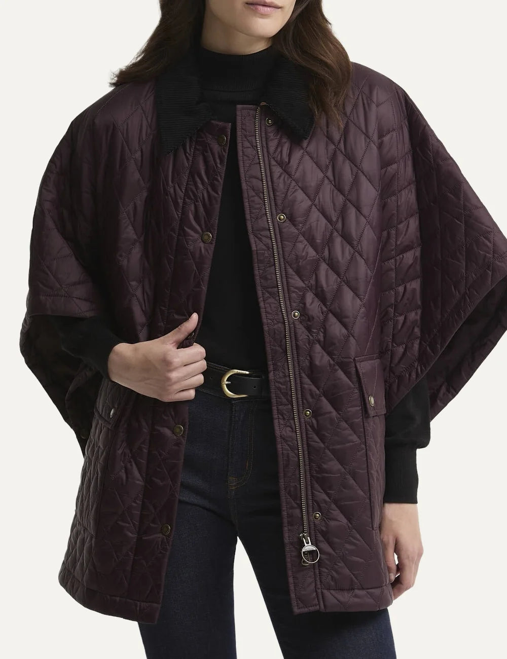 Barbour women's burgundy quilted cape with black corduroy collar snap fastening and large patch pockets model