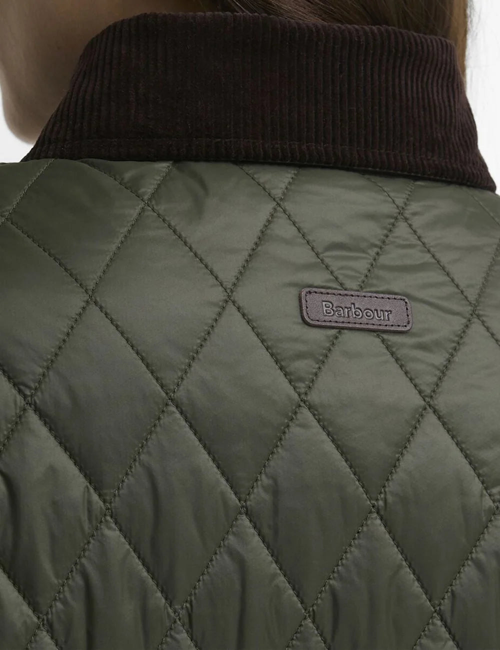 Women's Barbour dark khaki long quilted coat with brown corduroy collar and front pockets detail back