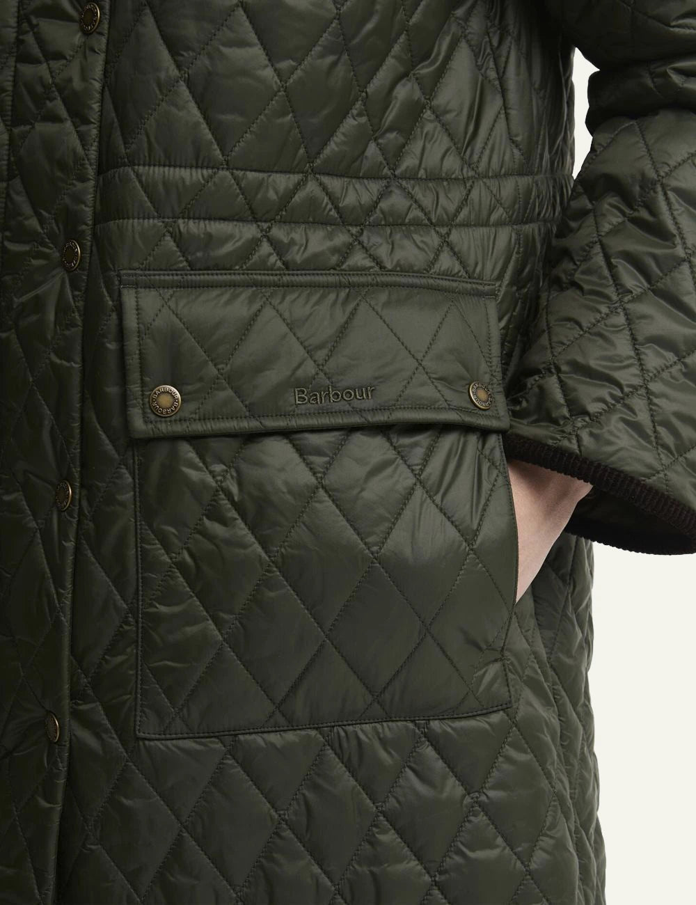 Women's Barbour dark khaki long quilted coat with brown corduroy collar and front pockets pocket