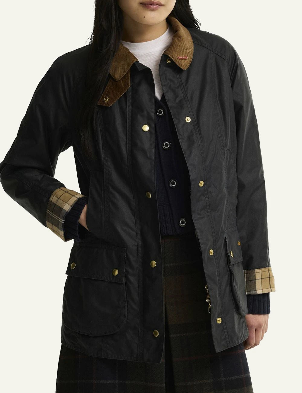 Women's Barbour dark navy waxed cotton jacket with brown corduroy collar and gold-tone buttons model