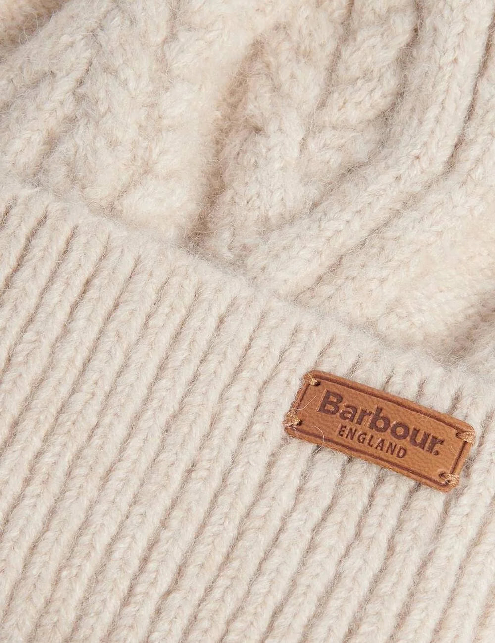 Barbour women's ecru cable knit beanie with faux fur pom pom and ribbed turn-up cuff detail