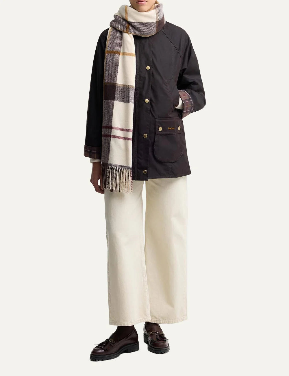 Barbour women's ecru tartan scarf with brown and burgundy checks and fringe trims model