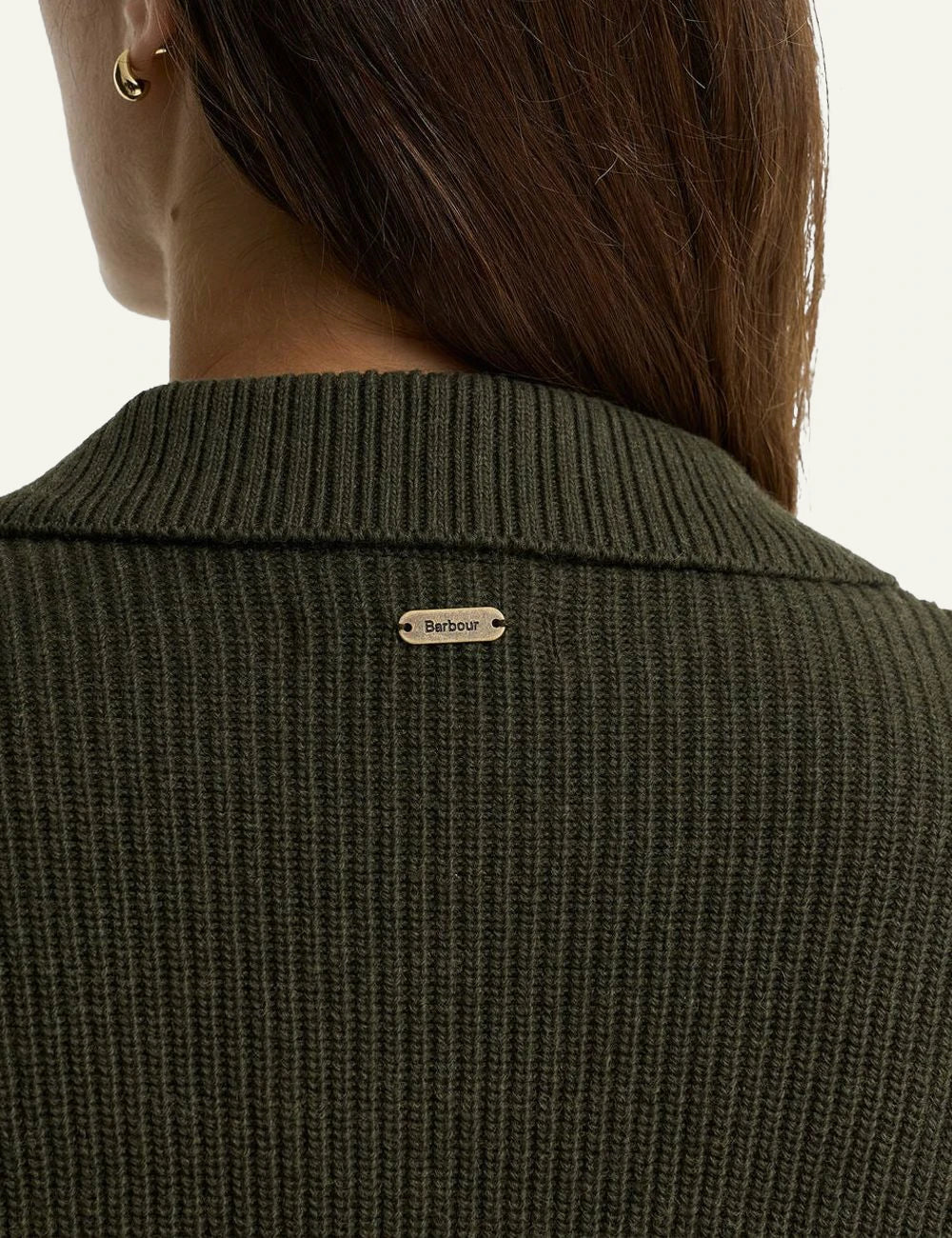 Women's Barbour khaki quilted jacket with knitted sleeves and front pockets detail back