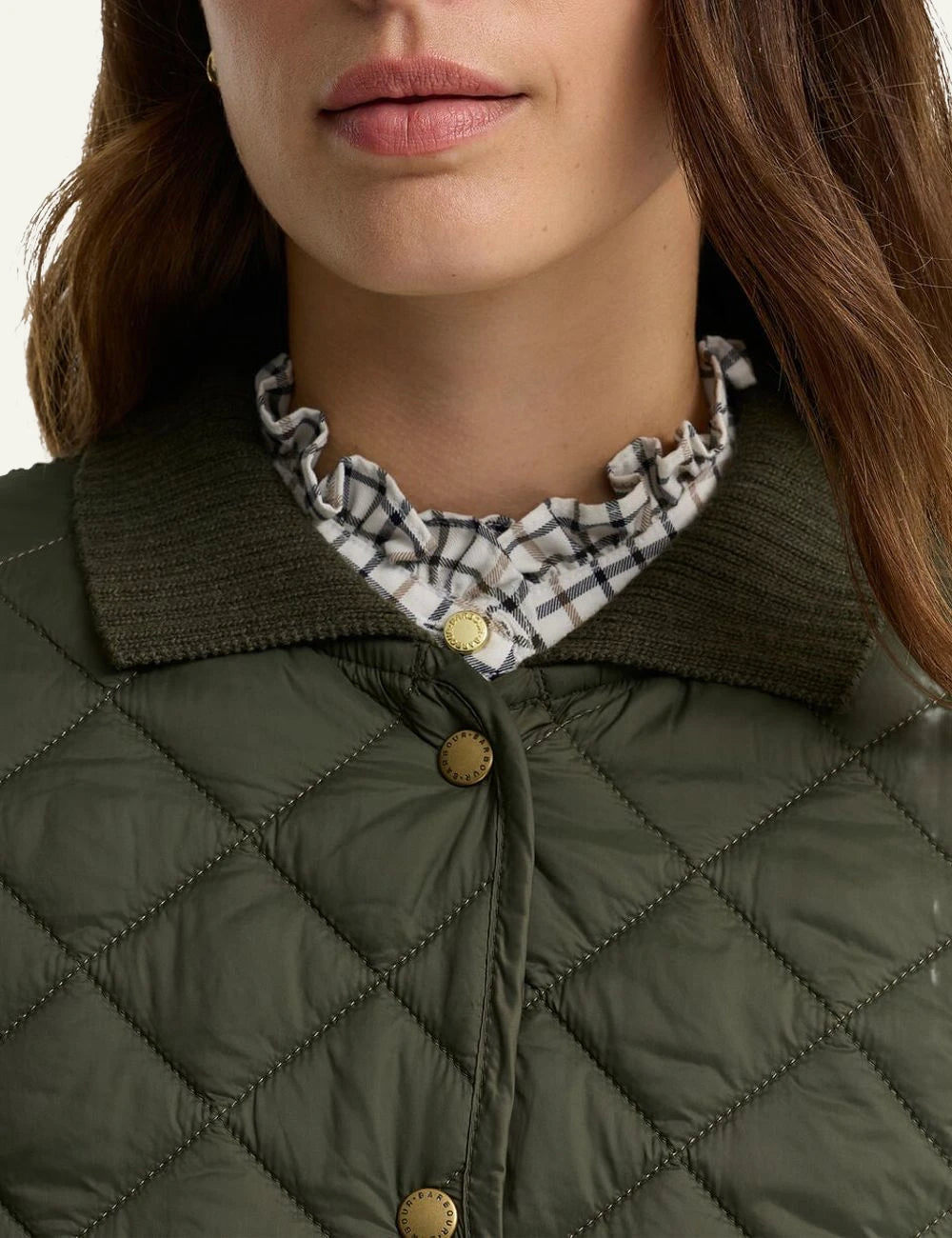 Women's Barbour khaki quilted jacket with knitted sleeves and front pockets detail