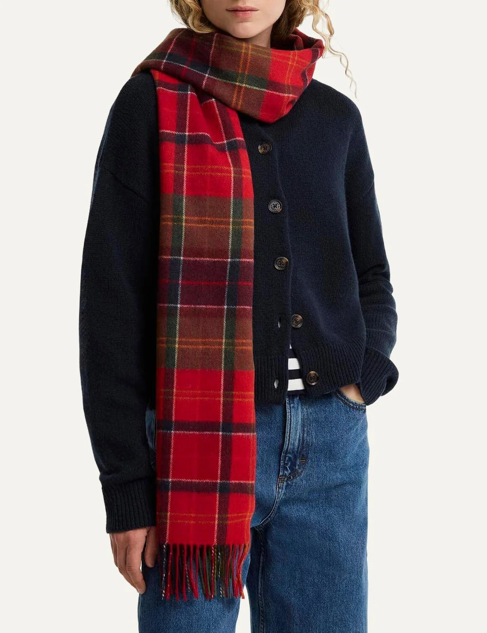 Barbour women's red lambswool scarf with patchwork tartan pattern and fringe trims model
