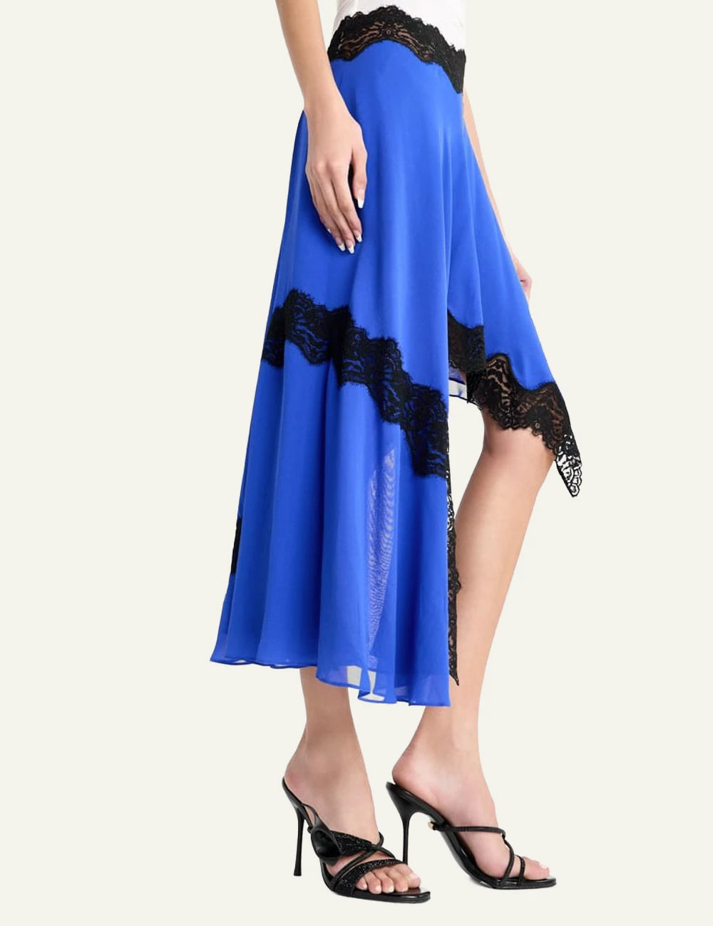 Black high heel sandals worn with blue skirt lifestyle view