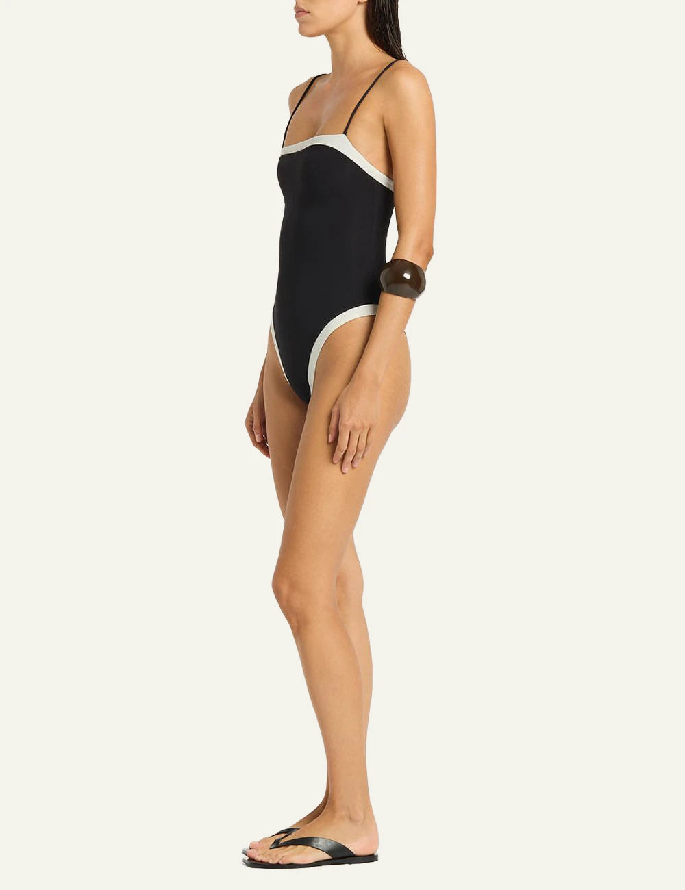 Bound reversible one piece black coconut side view