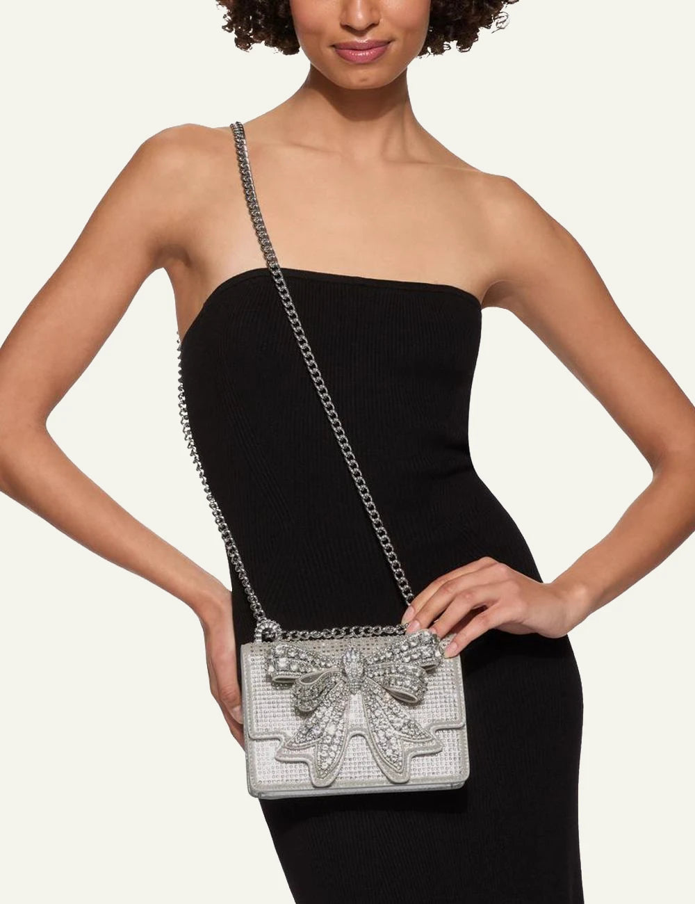 Kurt Geiger London Small Shoreditch silver bag worn crossbody on model