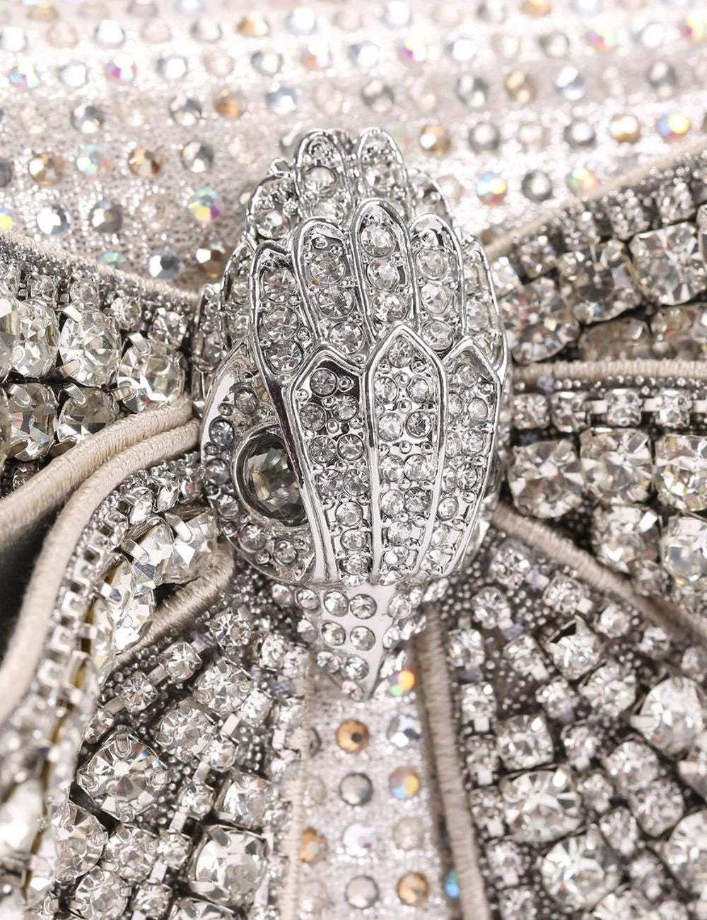 Kurt Geiger London silver crystal bow and eagle head clasp detail