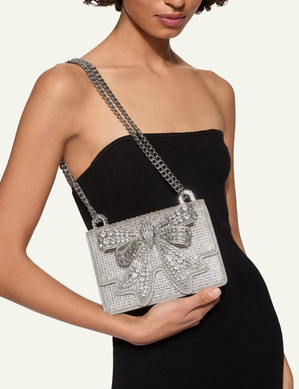 Kurt Geiger London Small Shoreditch silver crystal bag worn on model