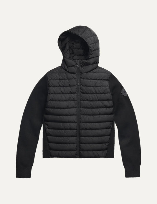 Women's Canada Goose HyBridge Hayes black hybrid down jacket with quilted front, down-filled hood, merino wool sleeves, full zip closure and logo patch.