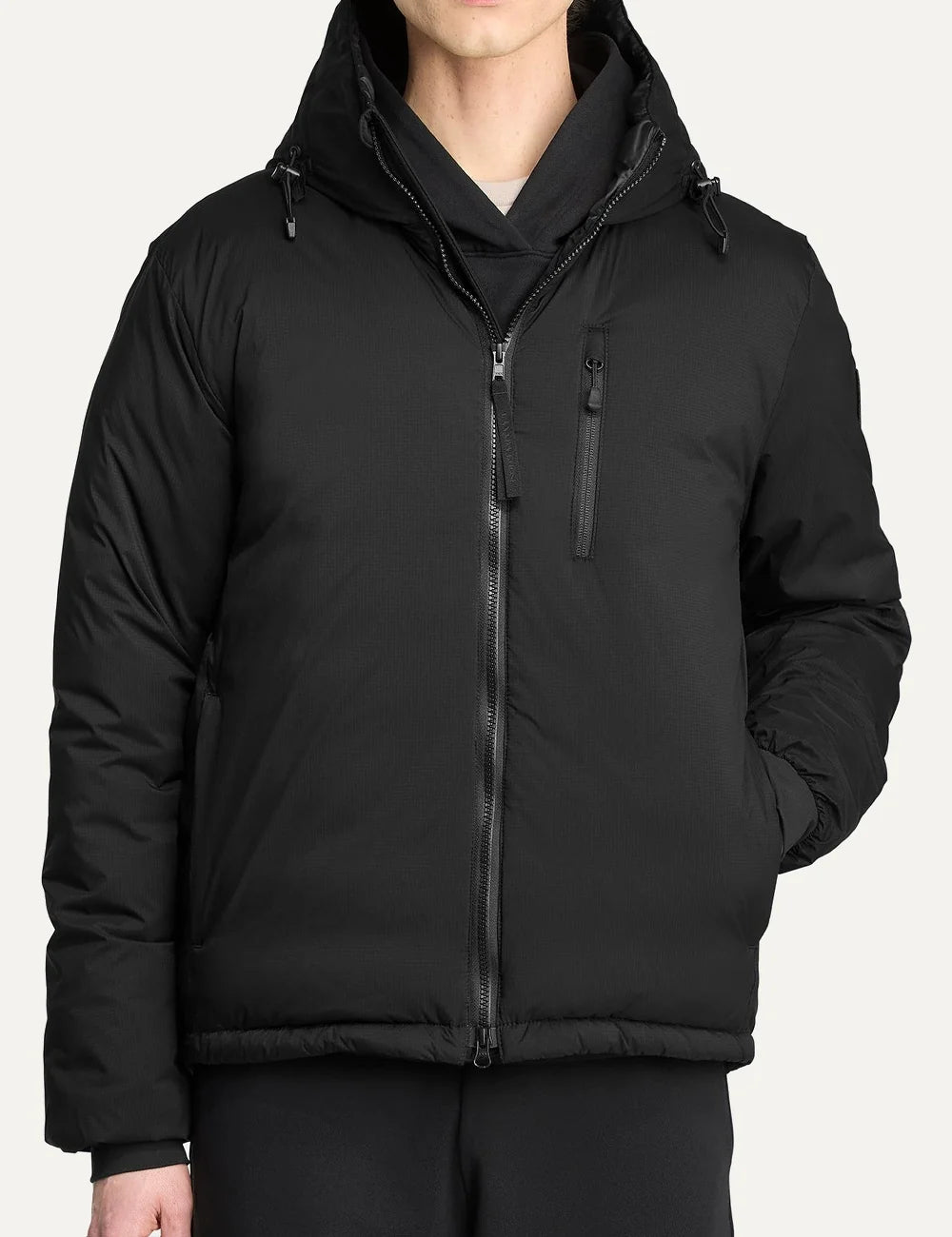 Canada Goose men's Lodge Hoodie black lightweight down jacket with adjustable hood, windproof nylon ripstop shell, zippered pockets and logo patch model