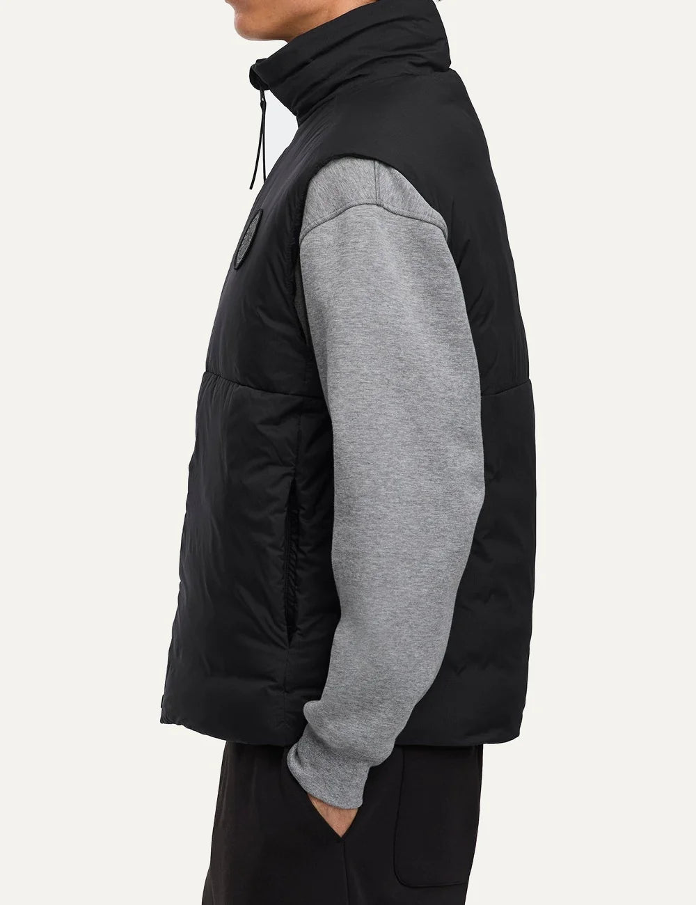 Canada Goose men's Lodge Vest black lightweight water-repellent and wind-resistant puffer vest with high collar, two-way zipper and logo patch side