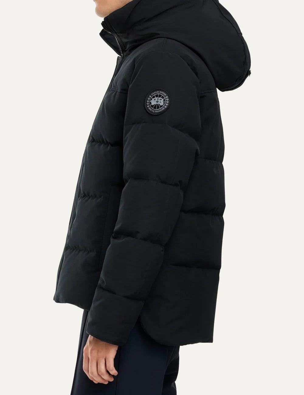 Canada Goose men's MacMillan Parka black down-filled quilted jacket with adjustable hood, two-way zipper, fleece-lined pockets and logo patch side