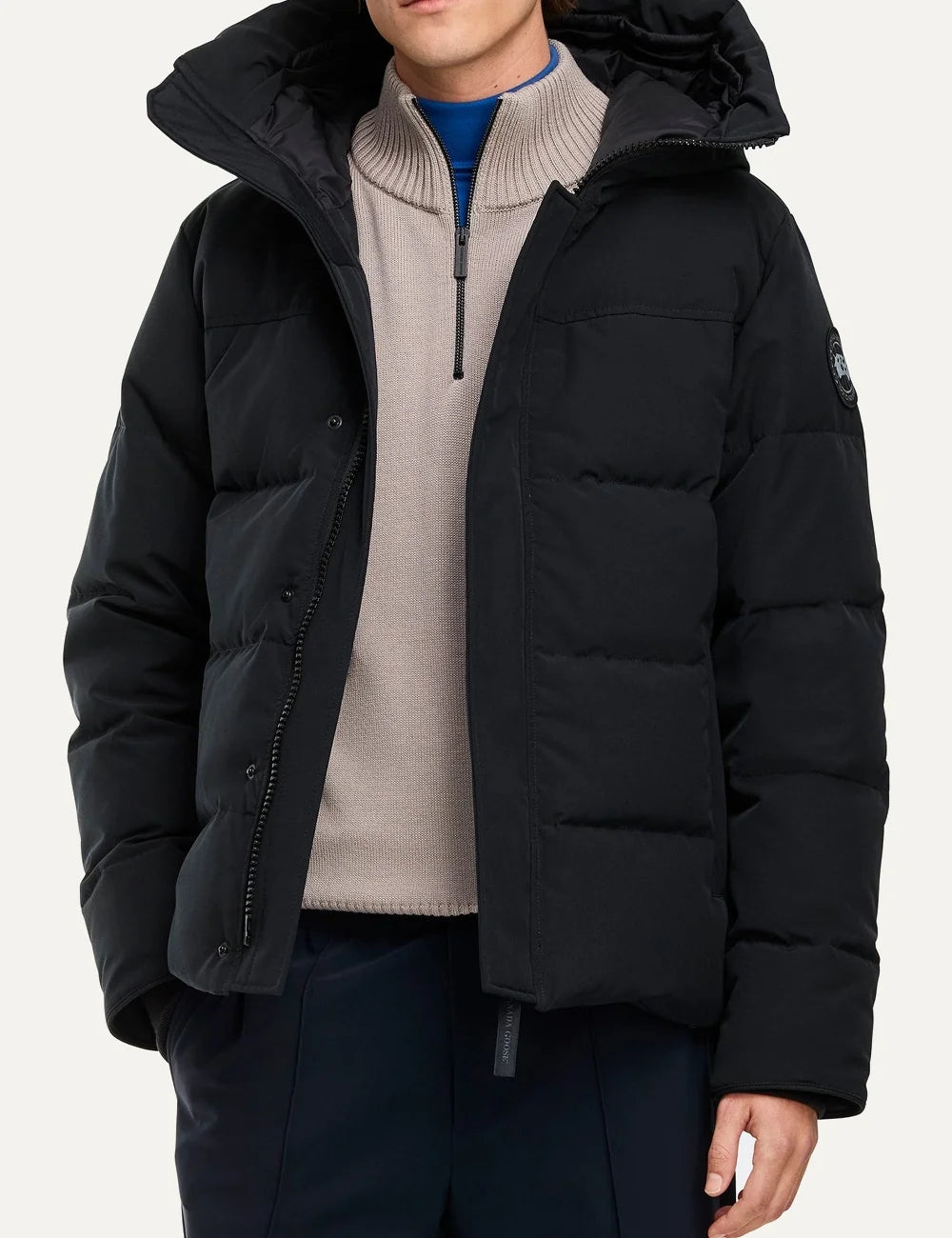 Canada Goose men's MacMillan Parka black down-filled quilted jacket with adjustable hood, two-way zipper, fleece-lined pockets and logo patch model