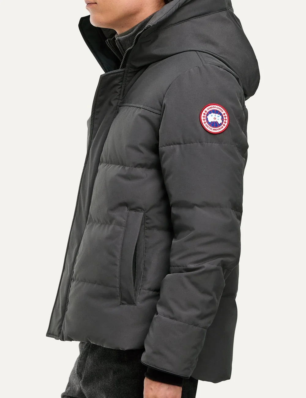 Canada Goose men's MacMillan Parka dark grey down-filled quilted jacket with adjustable hood, two-way zipper, fleece-lined pockets and logo patch side
