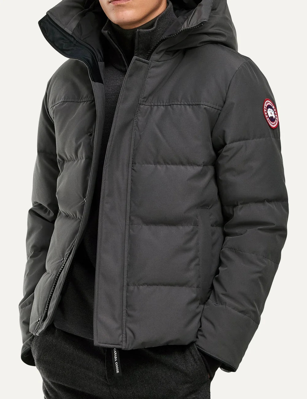 Canada Goose men's MacMillan Parka dark grey down-filled quilted jacket with adjustable hood, two-way zipper, fleece-lined pockets and logo patch model